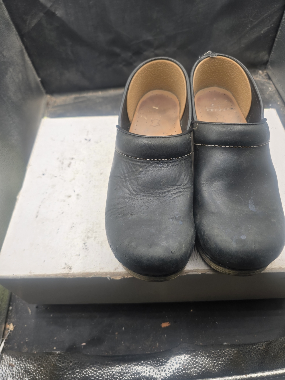 Dansko Black Leather Slip-On Clogs